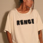 Beige Oversized Scrap tee.