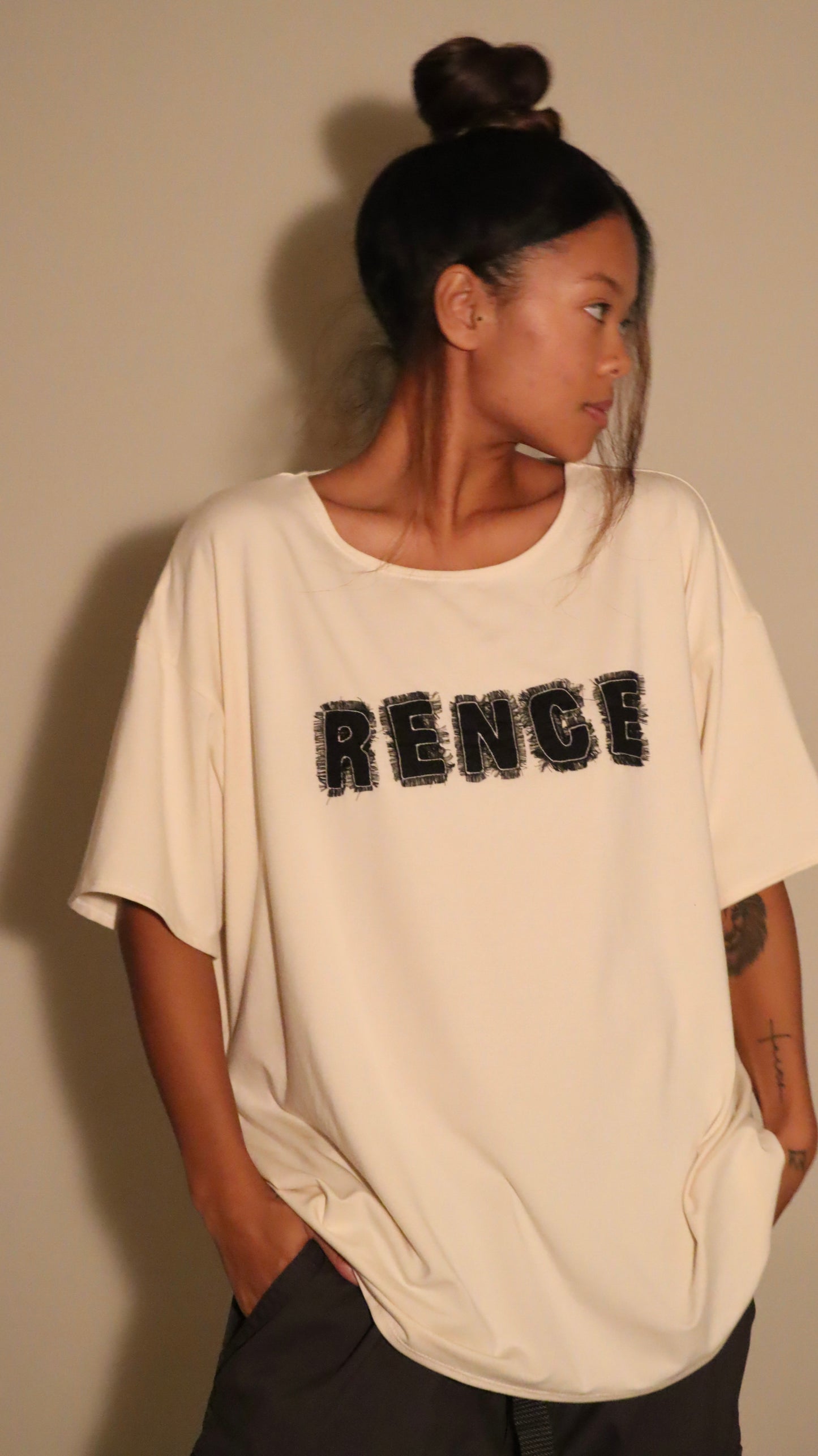 Beige Oversized Scrap tee.